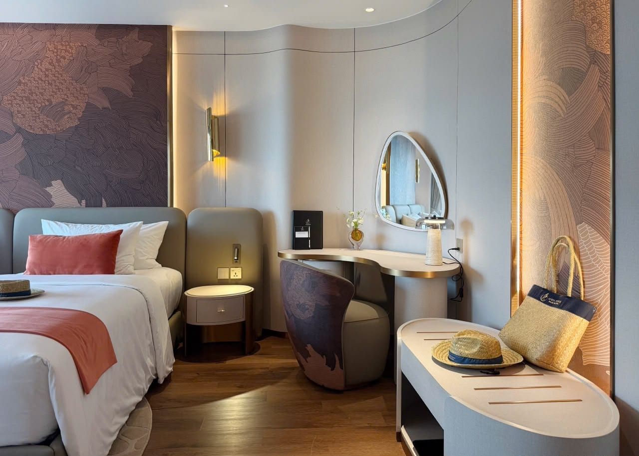 An Athena Premium cabin with a dressing table and a floral wall panel
