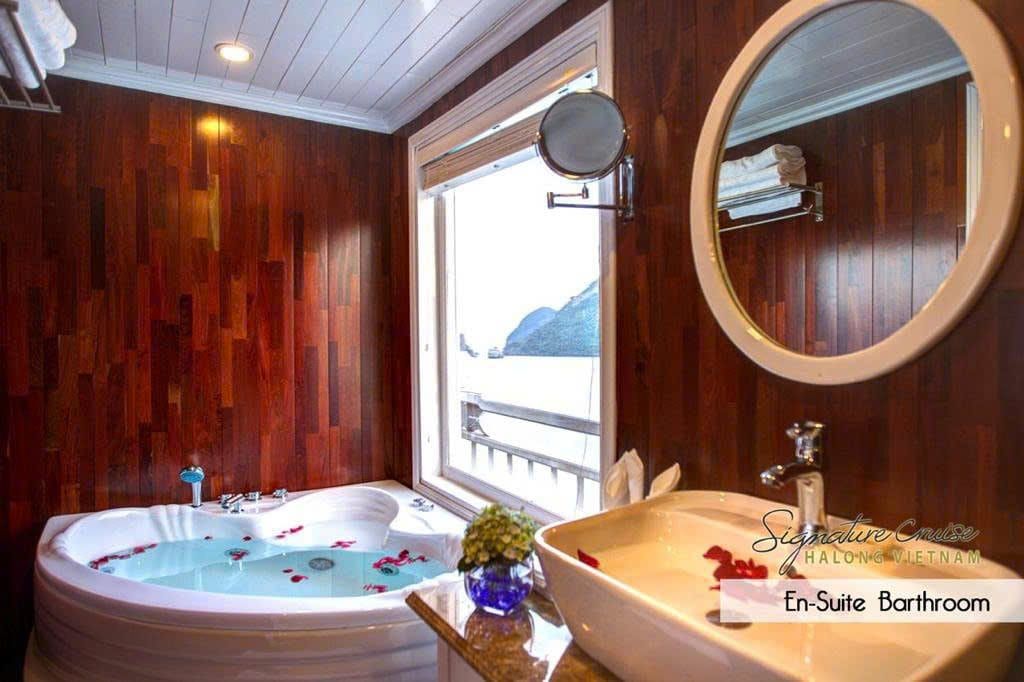 A corner jacuzzi bathtub in the Elite Family Suite on Signature Halong