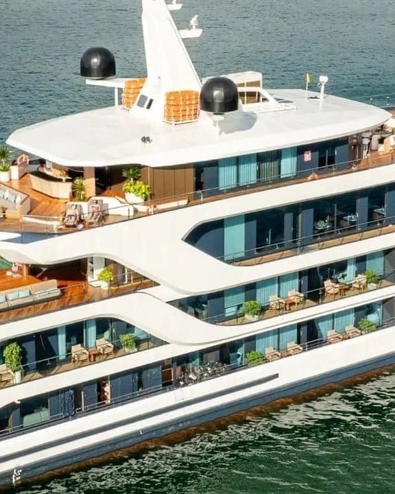 The balconied decks of Azura Cruise seen from the water